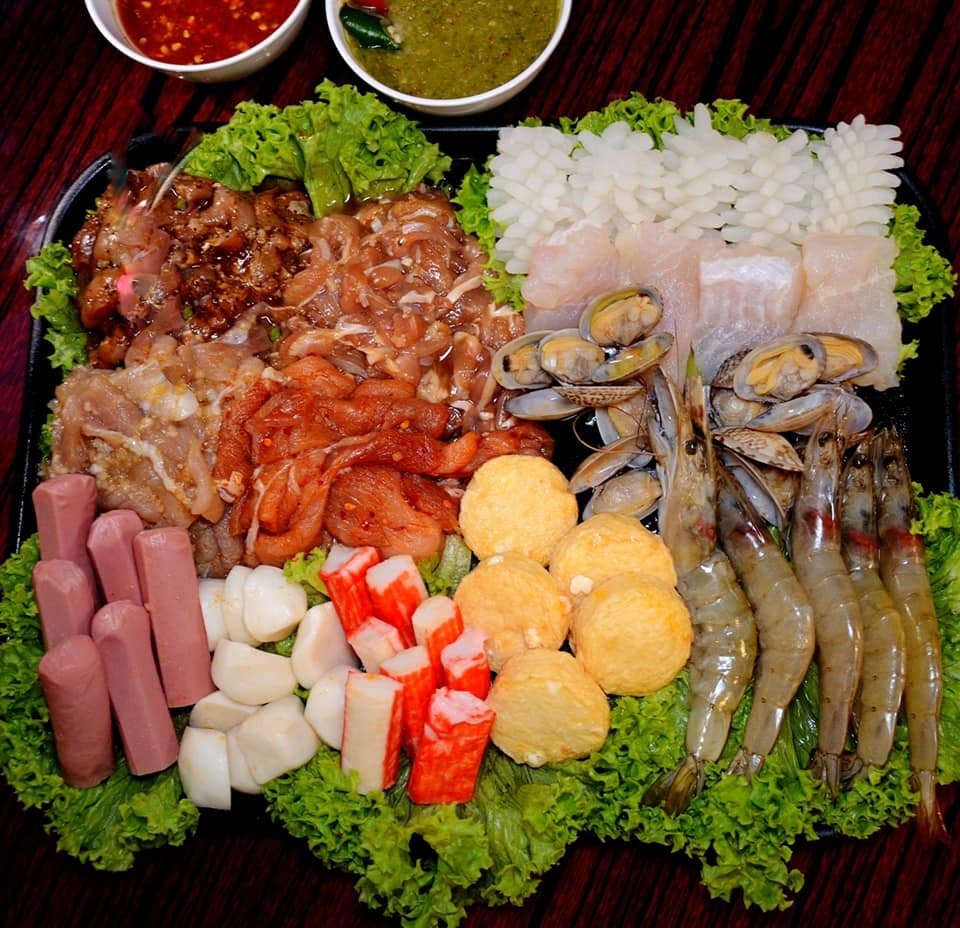 A large platter from Zenso Thai laden with assorted raw ingredients for Mookata