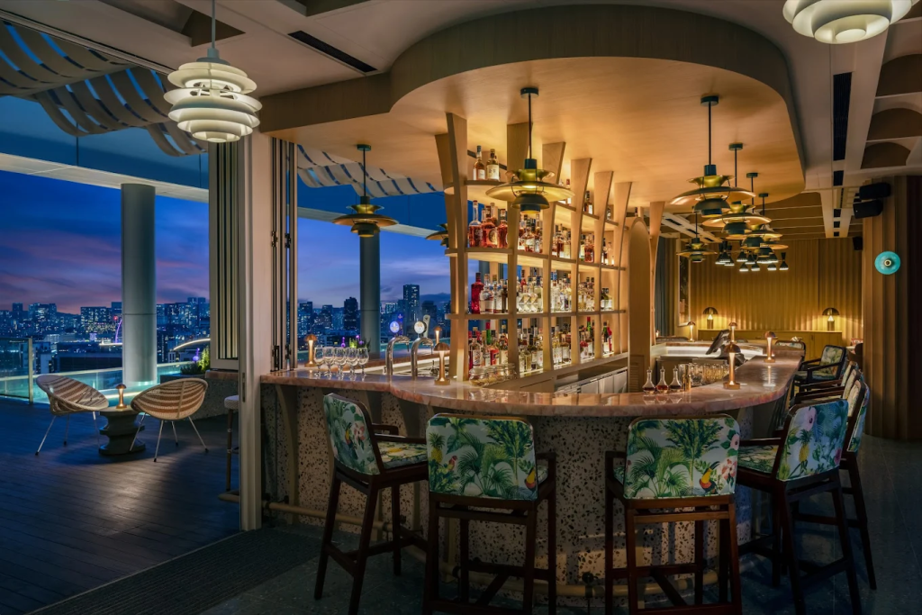 Stunning twilight view of Las Palmas Rooftop Bar in Singapore
